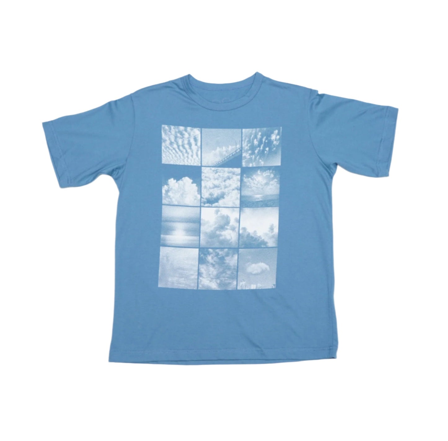 A blue t-shirt with a central graphic of a grid of white cloud images against a blue background.