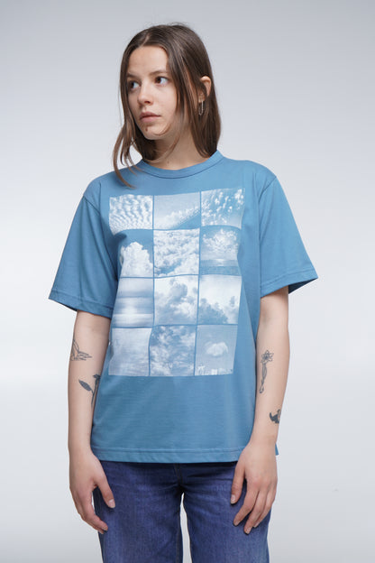 Unisex cotton T-shirt with silkscreen cloud print artwork, shown in blue, produced in Kyiv.