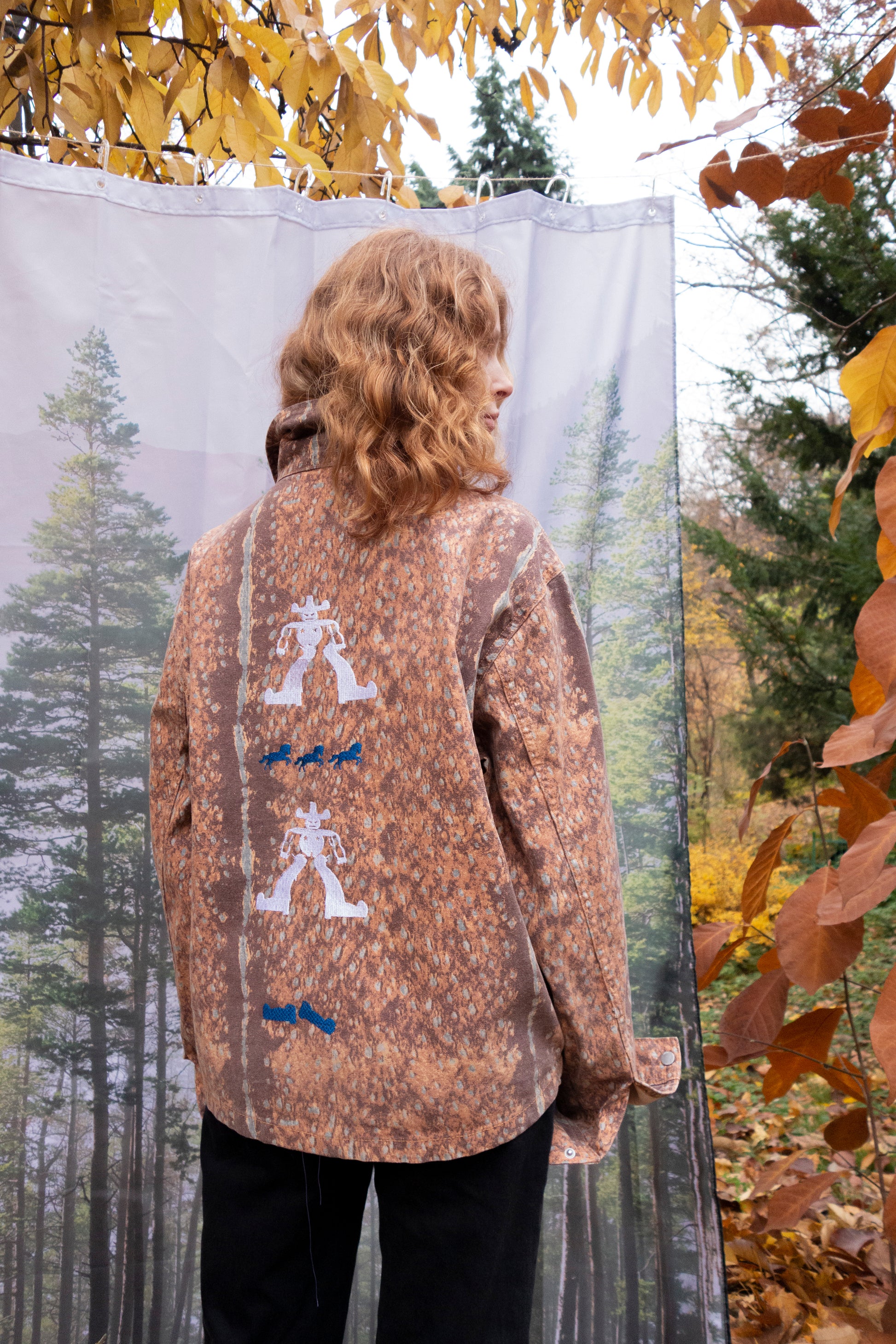One-of-a-kind upcycled jacket featuring detailed cowboy embroidery inspired by Max Blessificator’s illustrations.