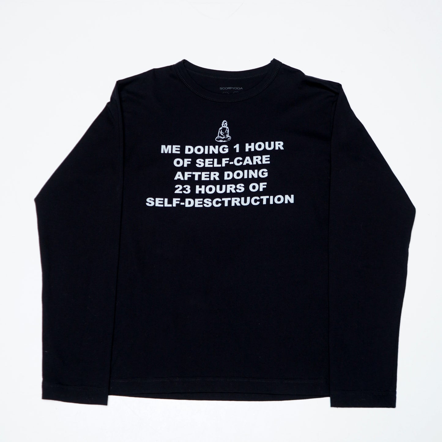 Graphic unisex long sleeve made in collaboration with Scorpyoga, featuring silkscreen text "me doing 1h of selfcare after doing 23h of self-destruction".