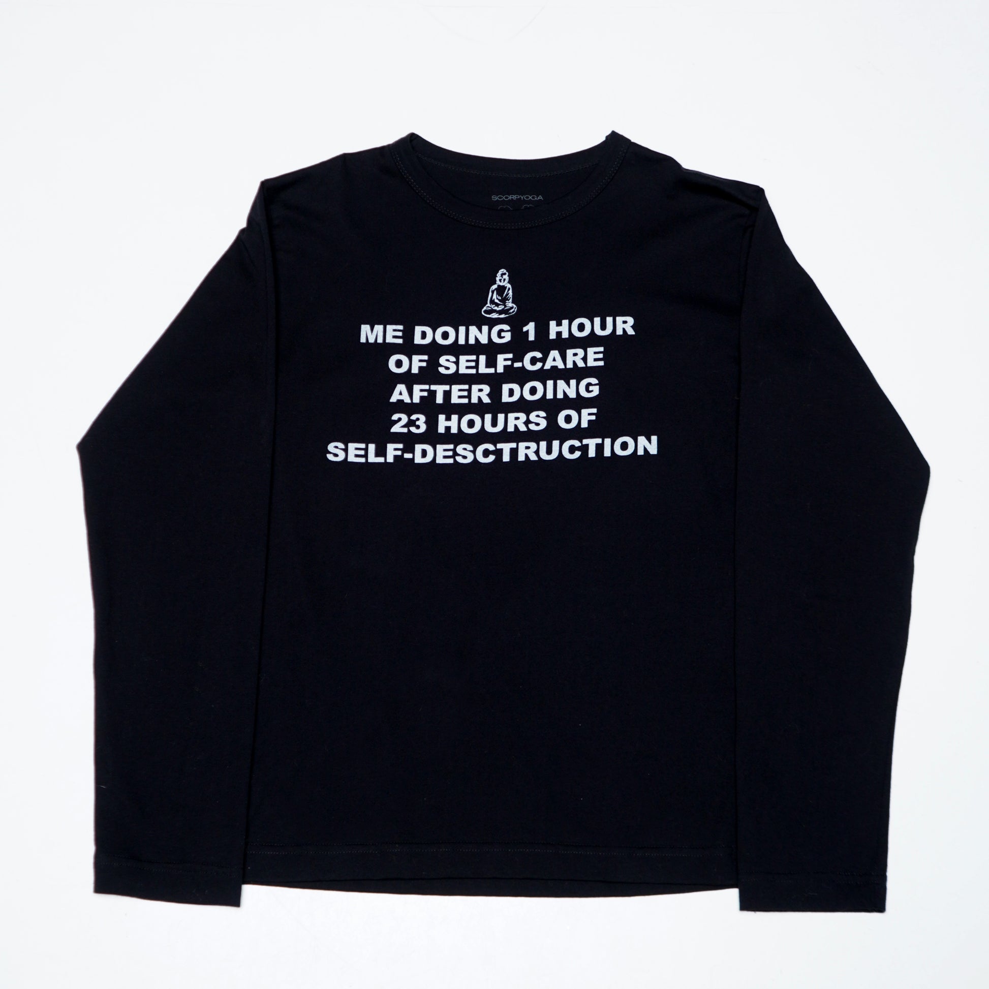 Graphic unisex long sleeve made in collaboration with Scorpyoga, featuring silkscreen text "me doing 1h of selfcare after doing 23h of self-destruction".